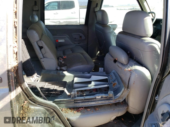 1999 GMC Yukon with VIN 1GKEC13R5XJ761595, listed as a Copart auction lot 69677904 with 174,735 mi miles and Clean Title. Bid and sale history available at carsss.com. Image 10.