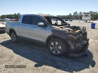 2019 Honda Ridgeline RTL-E with VIN 5FPYK3F77KB015092, listed as a Copart auction lot 48459345 with Not provided miles and Salvage title. Bid and sale history available at DreamBid. Image 4.