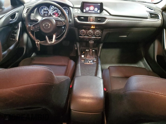 2017 Mazda 6 Sport z VIN JM1GL1U5XH1127345, wystawiony jako Copart lot #56196575 z przebiegiem 131 059 mil mil oraz Szkoda całkowita • Salvage title. Historia ofert i sprzedaży dostępna na DreamBid. Obrazek 8.