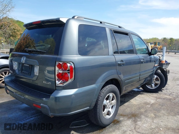 2006 Honda Pilot EX with VIN 2HKYF18416H529290, listed as a IAAI auction lot 41915915 with 135,385 mi miles and . Bid and sale history available at DreamBid. Image 4.