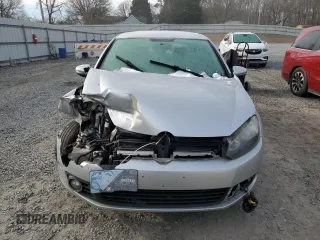 2013 Volkswagen Golf TDI w/Sunroof & Nav z VIN WVWNM7AJ2DW130973, wystawiony jako Copart lot #42105645 z przebiegiem 162 232 mil mil oraz Szkoda całkowita • Salvage title. Historia ofert i sprzedaży dostępna na DreamBid. Obrazek 5.