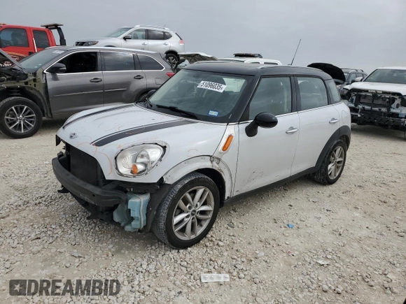 2013 MINI Countryman with VIN WMWZB3C5XDWM31620, listed as a Copart auction lot 51096035 with 93,928 mi miles and Salvage title. Bid and sale history available at DreamBid. Image 1.