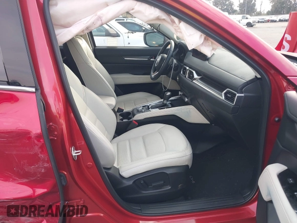 2023 Mazda CX-5 S Premium with VIN JM3KFBDM2P0130525, listed as a IAAI auction lot 41479518 with 18,145 mi miles and . Bid and sale history available at DreamBid. Image 5.