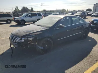 2014 Volkswagen CC R-Line with VIN WVWBP7AN5EE520423, listed as a Copart auction lot 60473015 with 70,257 mi miles and Salvage title. Bid and sale history available at DreamBid. Image 1.