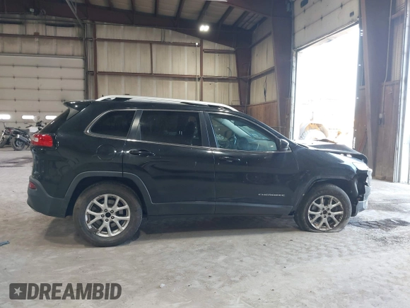 2016 Jeep Cherokee Latitude z VIN 1C4PJMCS3GW241848, wystawiony jako IAAI lot #42085623 z przebiegiem 95 477 mil mil oraz . Historia ofert i sprzedaży dostępna na DreamBid. Obrazek 14.