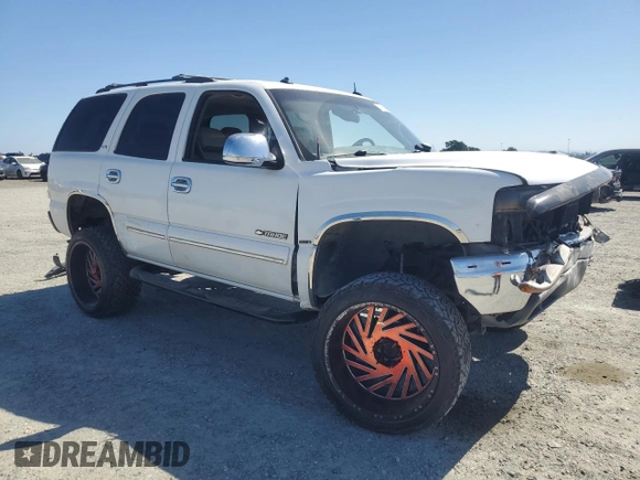 2002 Chevrolet Tahoe LS with VIN 1GNEC13T82J331096, listed as a Copart auction lot 55733485 with Not provided miles and Salvage title. Bid and sale history available at DreamBid. Image 4.