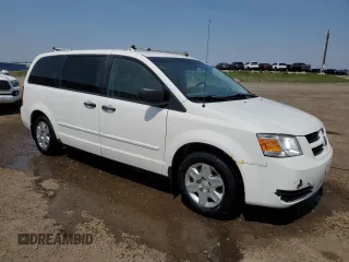 2009 Dodge Grand Caravan with VIN 1D8HN11E99B505784, listed as a Copart auction lot 60590065 with 195,488 mi miles and Salvage title. Bid and sale history available at DreamBid. Image 4.