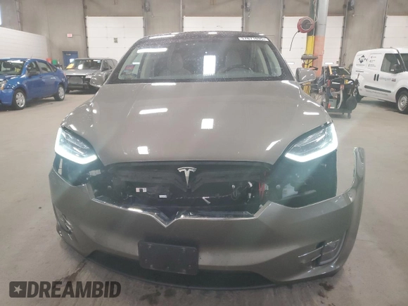 2016 Tesla Model X 70D z VIN 5YJXCBE20GF003018, wystawiony jako Copart lot #57671695 z przebiegiem 117 238 mil mil oraz Szkoda całkowita • Salvage title. Historia ofert i sprzedaży dostępna na DreamBid. Obrazek 5.