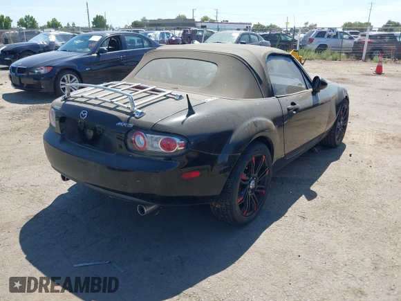 2006 Mazda MX-5 Miata Sport with VIN JM1NC25F860115878, listed as a IAAI auction lot 42842757 with 81,777 mi miles and . Bid and sale history available at DreamBid. Image 4.