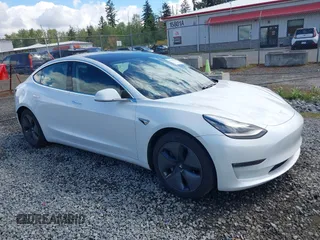 2020 Tesla Model 3 Long Range z VIN 5YJ3E1EB5LF619018, wystawiony jako IAAI lot #42131960 z przebiegiem 29 774 mil mil oraz . Historia ofert i sprzedaży dostępna na DreamBid. Obrazek 1.