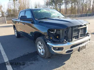 2020 Ram 1500 Big Horn with VIN 1C6SRFFT1LN420299, listed as a IAAI auction lot 41860036 with 52,063 mi miles. Bid and sale history available at carsss.com. Image 1.