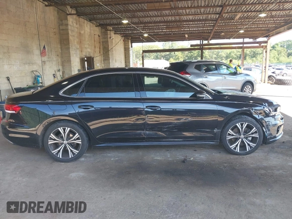 2021 Volkswagen Passat SE with VIN 1VWSA7A34MC008594, listed as a IAAI auction lot 40054898 with 78,664 mi miles and . Bid and sale history available at DreamBid. Image 13.