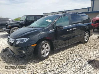 2019 Honda Odyssey EX-L z VIN 5FNRL6H7XKB057328, wystawiony jako Copart lot #56559525 z przebiegiem 98 506 mil mil oraz Czysty tytuł • Clean title. Historia ofert i sprzedaży dostępna na DreamBid. Obrazek 1.