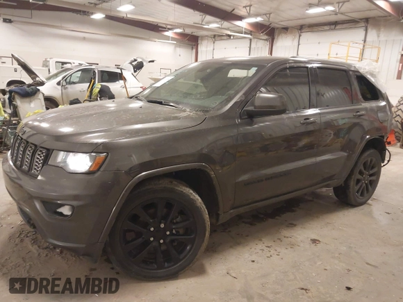 2018 Jeep Grand Cherokee Laredo E with VIN 1C4RJFAG6JC499261, listed as a IAAI auction lot 41033418 with 67,554 mi miles and . Bid and sale history available at DreamBid. Image 17.