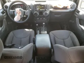 2014 Jeep Wrangler Unlimited Sport with VIN 1C4BJWDG1EL298161, listed as a Copart auction lot 61996735 with 176,043 mi miles and Salvage title. Bid and sale history available at DreamBid. Image 8.