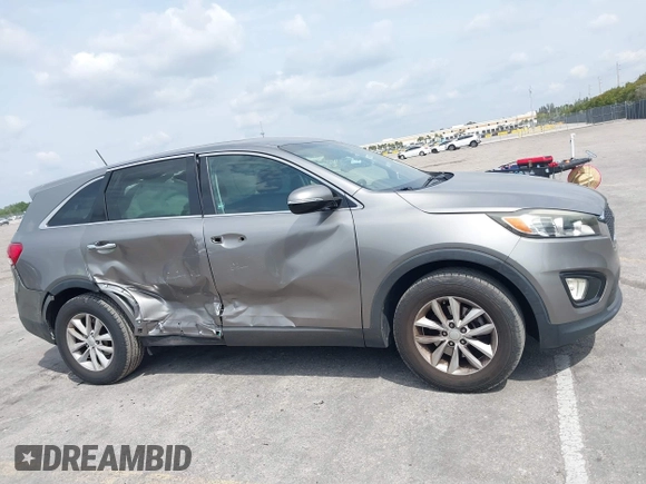 2016 Kia Sorento LX with VIN 5XYPG4A36GG171527, listed as a IAAI auction lot 41872641 with 95,012 mi miles and . Bid and sale history available at DreamBid. Image 13.