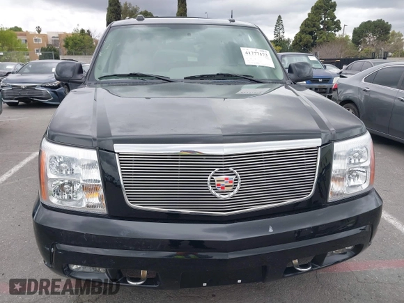 2005 Cadillac Escalade z VIN 1GYEC63T95R181022, wystawiony jako IAAI lot #41777173 z przebiegiem 44 348 mil mil oraz . Historia ofert i sprzedaży dostępna na DreamBid. Obrazek 6.