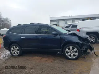2016 Chevrolet Traverse LT z VIN 1GNKRGKD5GJ166369, wystawiony jako IAAI lot #41468465 z przebiegiem 113 058 mil mil oraz . Historia ofert i sprzedaży dostępna na DreamBid. Obrazek 14.