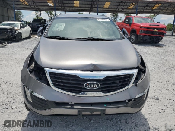 2011 Kia Sportage EX z VIN KNDPC3A23B7053471, wystawiony jako Copart lot #63685595 z przebiegiem 184 661 mil mil oraz Szkoda całkowita • Salvage title. Historia ofert i sprzedaży dostępna na DreamBid. Obrazek 5.