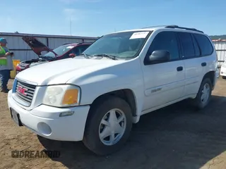 2003 GMC Envoy SLT with VIN 1GKDT13S232394707, listed as a IAAI auction lot 42084139 with 192,416 mi miles. Bid and sale history available at carsss.com. Image 2.
