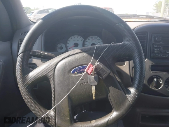 2002 Ford Escape XLS Value with VIN 1FMYU01B32KD20469, listed as a IAAI auction lot 42553573 with 353,752 mi miles and . Bid and sale history available at DreamBid. Image 11.