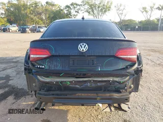 2016 Volkswagen Jetta Sport z VIN 3VWD17AJ5GM335337, wystawiony jako IAAI lot #42081987 z przebiegiem 93 215 mil mil oraz . Historia ofert i sprzedaży dostępna na DreamBid. Obrazek 17.