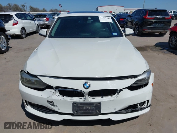 2015 BMW 3 Series 320i with VIN WBA3B1C53FK138341, listed as a IAAI auction lot 41757490 with 125,280 mi miles. Bid and sale history available at carsss.com. Image 12.