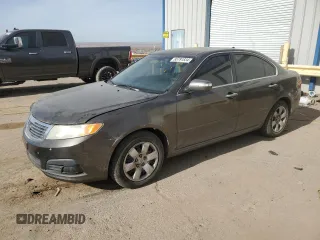 2009 Kia Optima LX z VIN KNAGE228695331967, wystawiony jako Copart lot #85791834 z przebiegiem 232 388 mil mil oraz Szkoda całkowita • Salvage title. Historia ofert i sprzedaży dostępna na DreamBid. Obrazek 1.