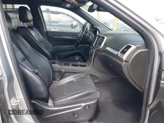 2014 Jeep Grand Cherokee Overland with VIN 1C4RJECG0EC291048, listed as a IAAI auction lot 41883941 with 81,871 mi miles. Bid and sale history available at carsss.com. Image 5.