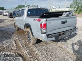 2021 Toyota Tacoma SR with VIN 5TFCZ5AN7MX255512, listed as a IAAI auction lot 42497907 with 50,563 mi miles and . Bid and sale history available at DreamBid. Image 3.