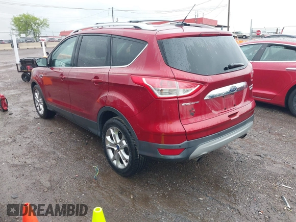 2014 Ford Escape Titanium with VIN 1FMCU0JX3EUD98815, listed as a IAAI auction lot 42078367 with 124,680 mi miles. Bid and sale history available at carsss.com. Image 3.