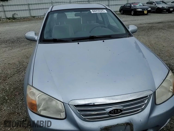 2007 Kia Spectra EX with VIN KNAFE121875438749, listed as a Copart auction lot 60255525 with 171,182 mi miles and Salvage title. Bid and sale history available at DreamBid. Image 13.
