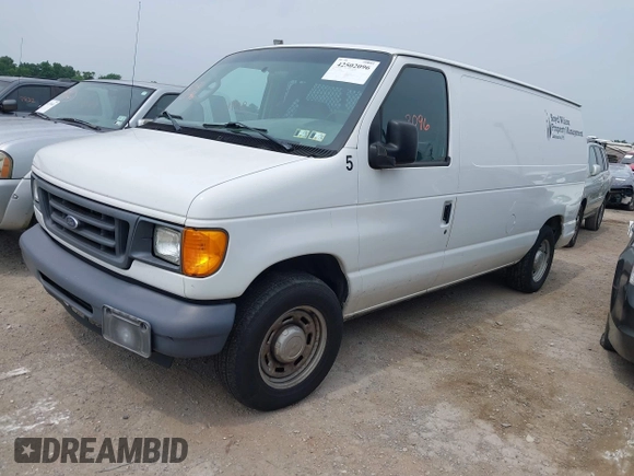 2006 Ford Econoline Cargo with VIN 1FTRE14WX6HB10268, listed as a IAAI auction lot 42502096 with 128,791 mi miles and . Bid and sale history available at DreamBid. Image 2.