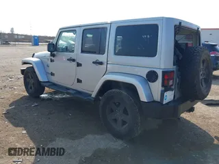 2012 Jeep Wrangler Unlimited Sahara with VIN 1C4HJWEG9CL146750, listed as a IAAI auction lot 41512678 with 94,952 mi miles. Bid and sale history available at carsss.com. Image 3.