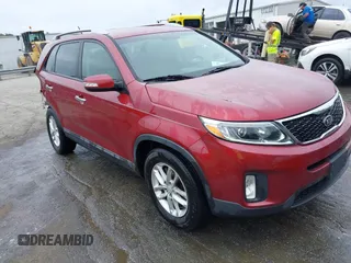 2015 Kia Sorento LX with VIN 5XYKTDA67FG569084, listed as a IAAI auction lot 42423806 with 70,476 mi miles and . Bid and sale history available at DreamBid. Image 1.