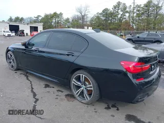 2019 BMW 7 Series 740i with VIN WBA7E2C57KB217973, listed as a IAAI auction lot 39064321 with 54,818 mi miles and . Bid and sale history available at DreamBid. Image 3.