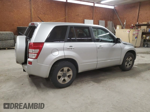 2012 Suzuki Grand Vitara Premium z VIN JS3TD0D2XC4100425, wystawiony jako Copart lot #49080815 z przebiegiem 108 780 mil mil oraz Szkody całkowita. Historia ofert i sprzedaży dostępna na DreamBid. Obrazek 3.