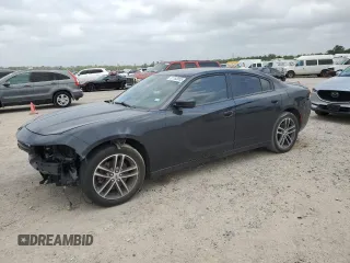 2019 Dodge Charger SXT with VIN 2C3CDXJG6KH630999, listed as a Copart auction lot 51183035 with 106,066 mi miles and Salvage Title. Bid and sale history available at DreamBid. Image 1.