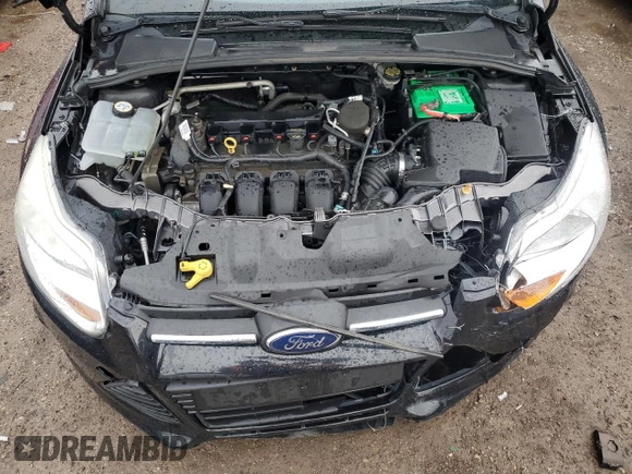 2013 Ford Focus SE z VIN 1FADP3F21DL306223, wystawiony jako Copart lot #51498105 z przebiegiem 135 627 mil mil oraz Szkoda całkowita • Salvage title. Historia ofert i sprzedaży dostępna na DreamBid. Obrazek 11.