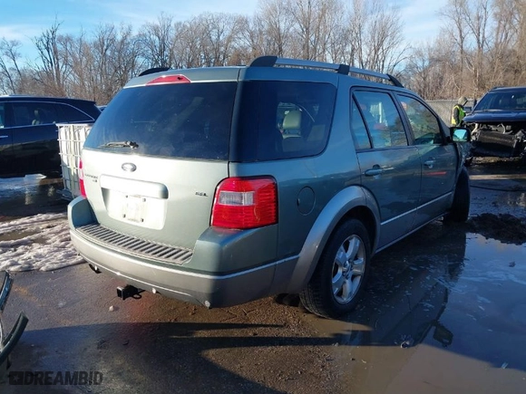2006 Ford Freestyle SEL with VIN 1FMZK05156GA05063, listed as a IAAI auction lot 41348945 with 214,223 mi miles. Bid and sale history available at carsss.com. Image 4.