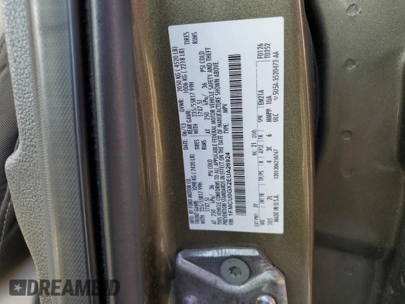 2014 Ford Escape SE z VIN 1FMCU0GX2EUA26924, wystawiony jako Copart lot #55389485 z przebiegiem 102 537 mil mil oraz Szkoda całkowita • Salvage title. Historia ofert i sprzedaży dostępna na DreamBid. Obrazek 13.