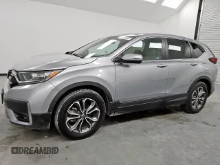 2021 Honda CR-V EX z VIN 5J6RW1H52MA009238, wystawiony jako Copart lot #60725395 z przebiegiem 135 081 mil mil oraz Czysty tytuł • Clean title. Historia ofert i sprzedaży dostępna na DreamBid. Obrazek 1.