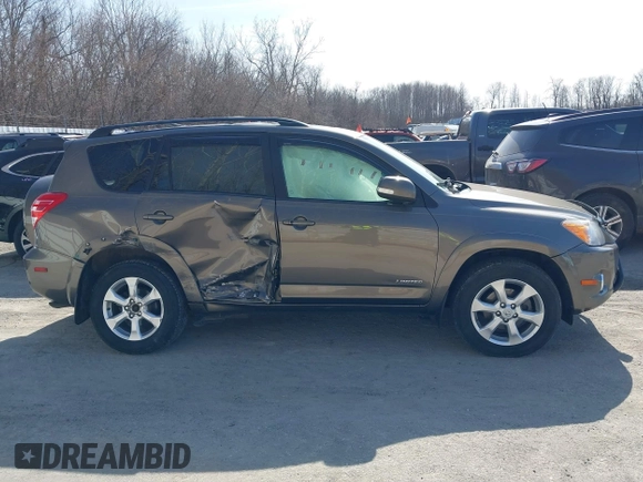 2012 Toyota RAV4 Limited z VIN 2T3DK4DV2CW090082, wystawiony jako IAAI lot #41776157 z przebiegiem 166 327 mil mil oraz . Historia ofert i sprzedaży dostępna na DreamBid. Obrazek 13.