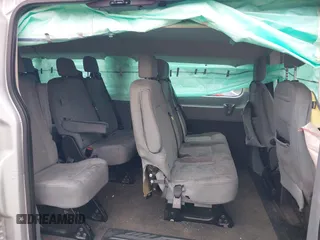 2018 Ford Transit Passenger XL z VIN 1FBZX2ZM2JKB02141, wystawiony jako IAAI lot #41914073 z przebiegiem 103 718 mil mil oraz . Historia ofert i sprzedaży dostępna na DreamBid. Obrazek 8.