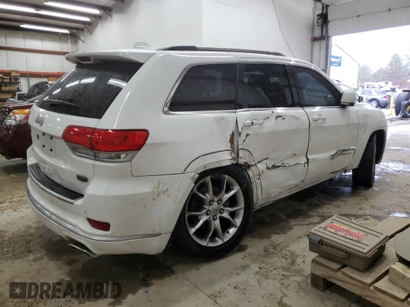 2015 Jeep Grand Cherokee Summit with VIN 1C4RJFJG9FC794992, listed as a Copart auction lot 42790355 with 74,044 mi miles and Salvage Title. Bid and sale history available at DreamBid. Image 3.