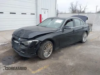 2014 BMW 3 Series 328i xDrive with VIN WBA3B5G56ENS06534, listed as a IAAI auction lot 41549553 with 165,779 mi miles and . Bid and sale history available at DreamBid. Image 2.