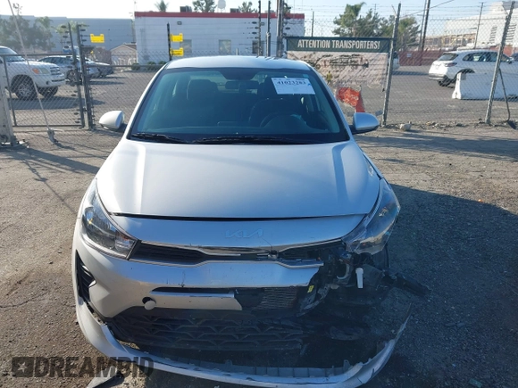 2023 Kia Rio LX with VIN 3KPA24AD1PE599290, listed as a IAAI auction lot 41023283 with 10,027 mi miles and . Bid and sale history available at DreamBid. Image 12.