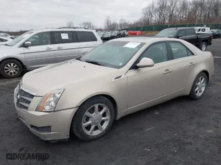2009 Cadillac CTS AWD w/1SA with VIN 1G6DG577790121184, listed as a IAAI auction lot 41739559 with 156,379 mi miles. Bid and sale history available at carsss.com. Image 2.