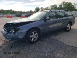 2001 Ford Taurus SE Standard with VIN 1FAHP58S71G184725, listed as a Copart auction lot 56401895 with 163,238 mi miles and Salvage title. Bid and sale history available at DreamBid. Image 1.