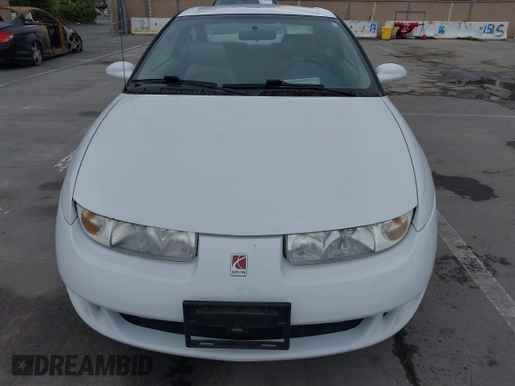 1999 Saturn SC z VIN 1G8ZY1271XZ276834, wystawiony jako IAAI lot #41445985 z przebiegiem 62 428 mil mil oraz . Historia ofert i sprzedaży dostępna na DreamBid. Obrazek 6.